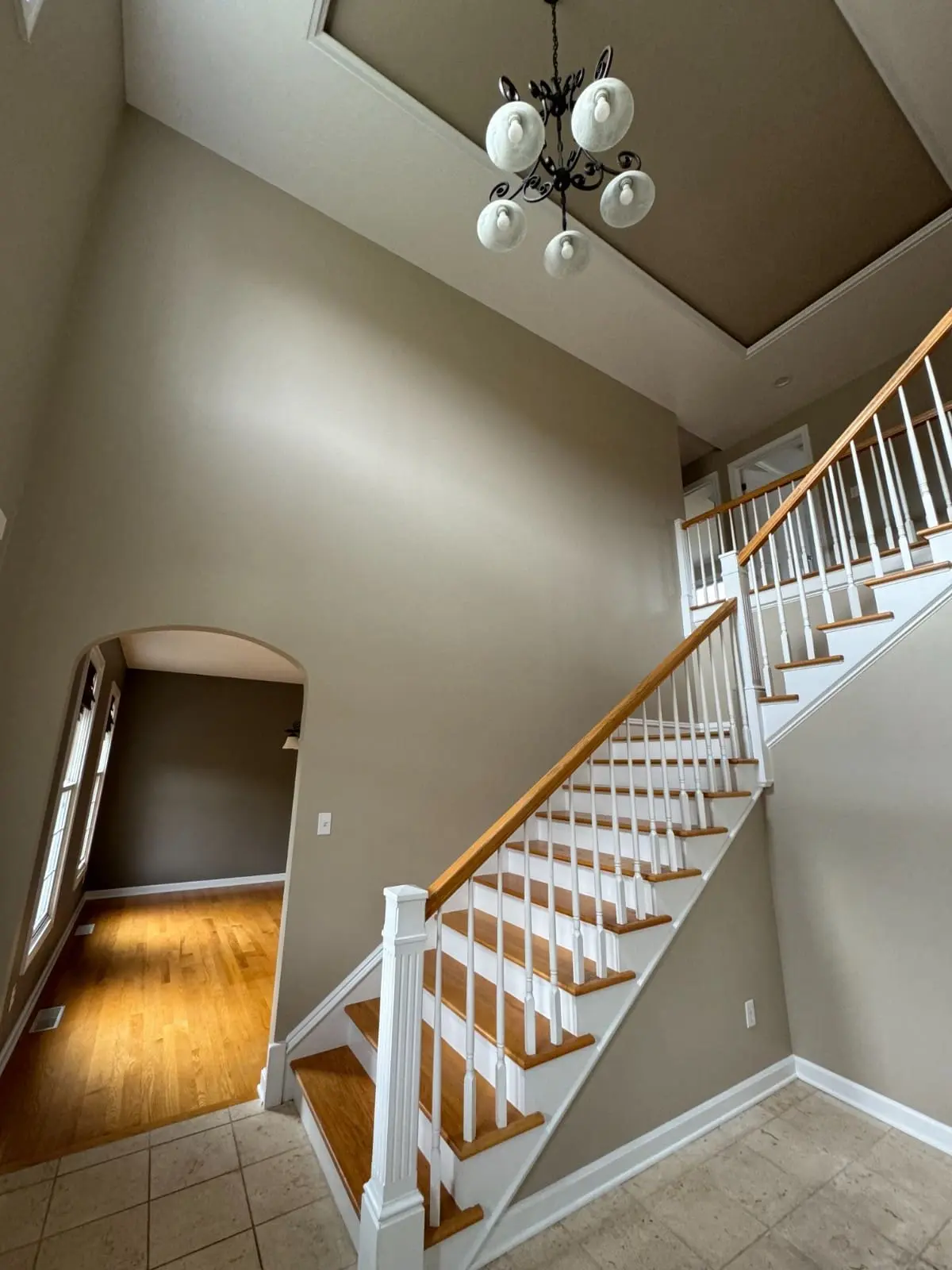 True North Painting interior painting taupe two story foyer staircase Chesterland Ohio