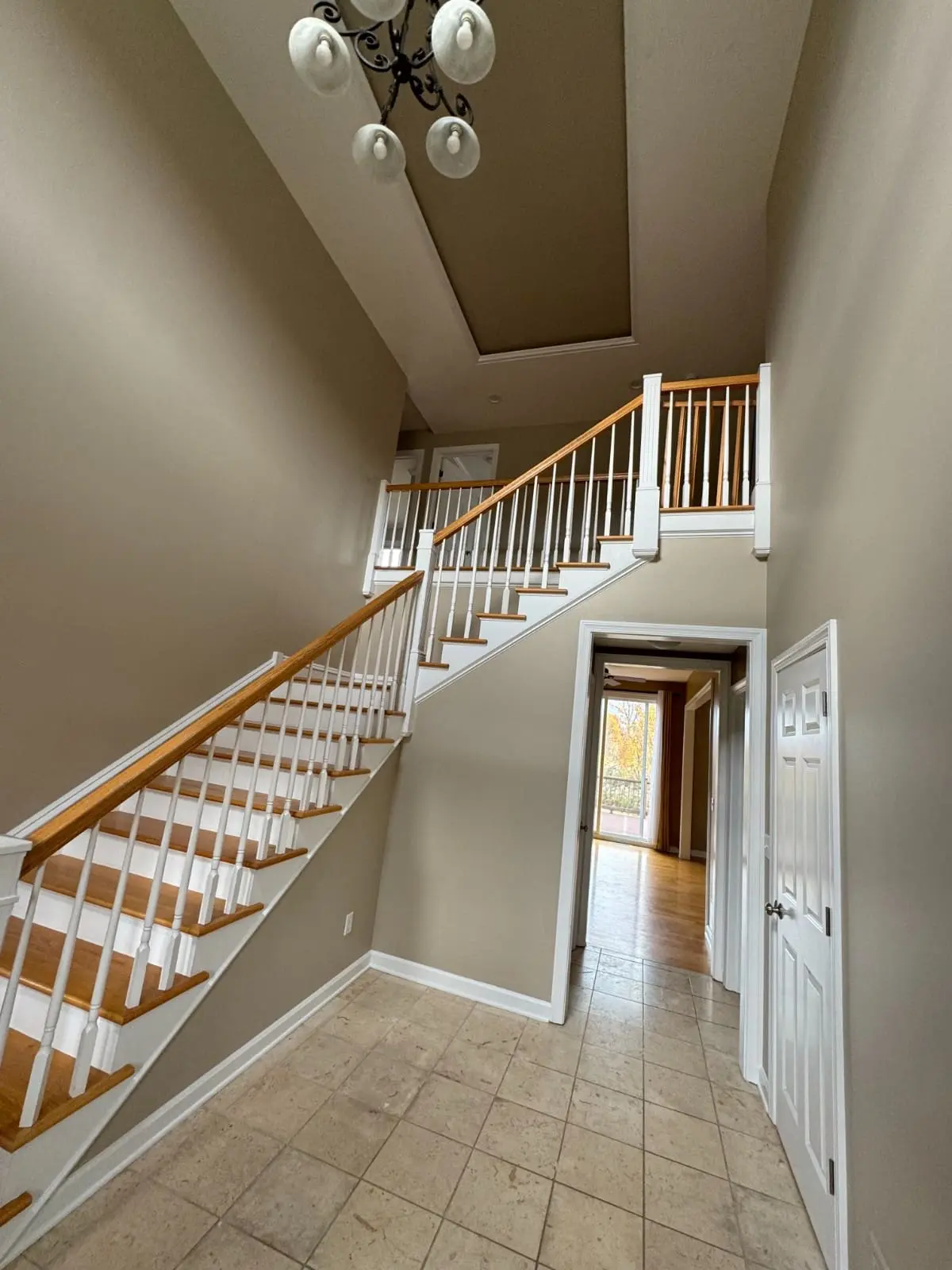 True North Painting interior painting gallery taupe foyer staircase white trim Chesterland Ohio