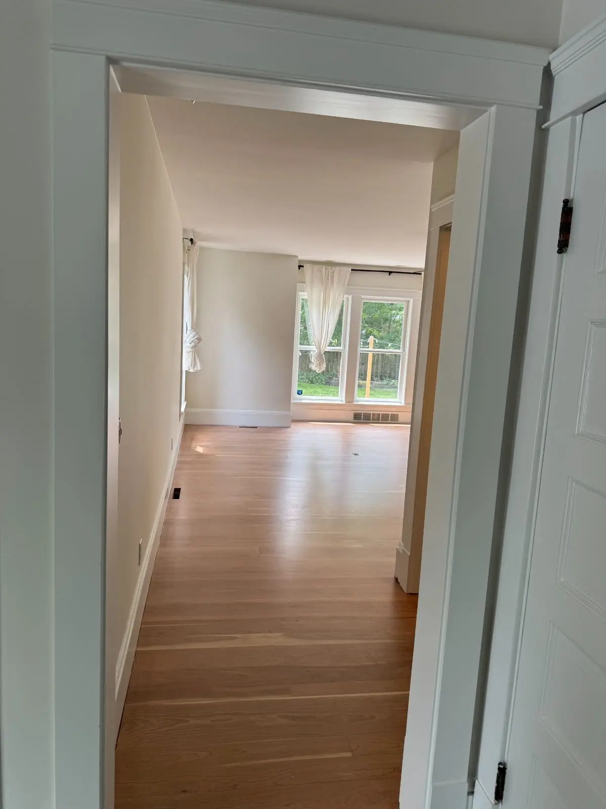 True North Painting interior painting warm white hallway into bedroom Chesterland Ohio