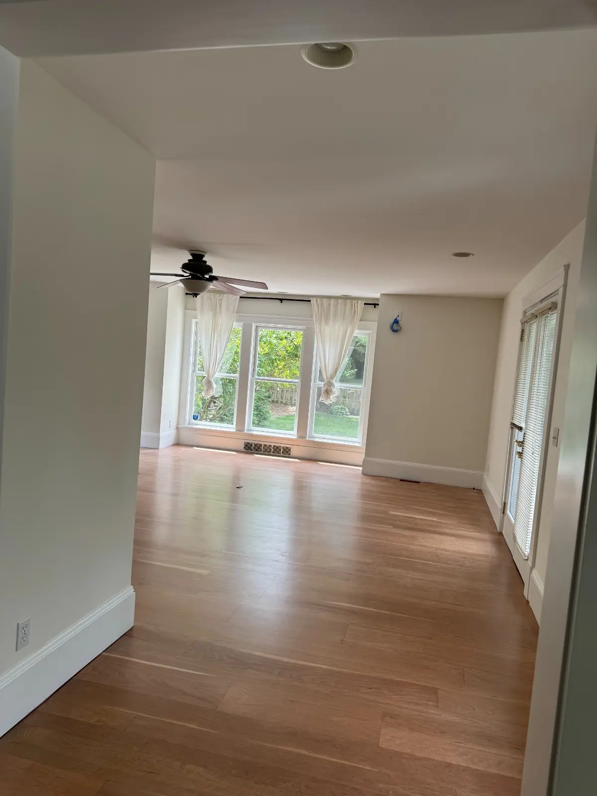 True North Painting interior painting bright white living room hardwood floors Chesterland Ohio