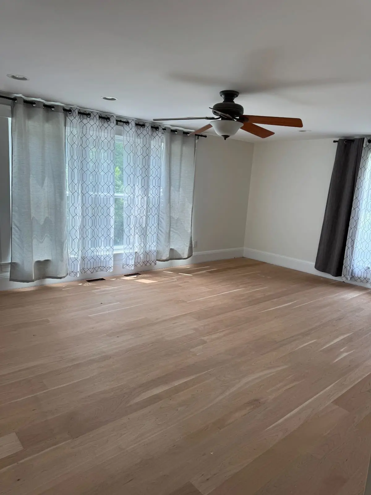 True North Painting interior painting white living room hardwood floors Chesterland Ohio