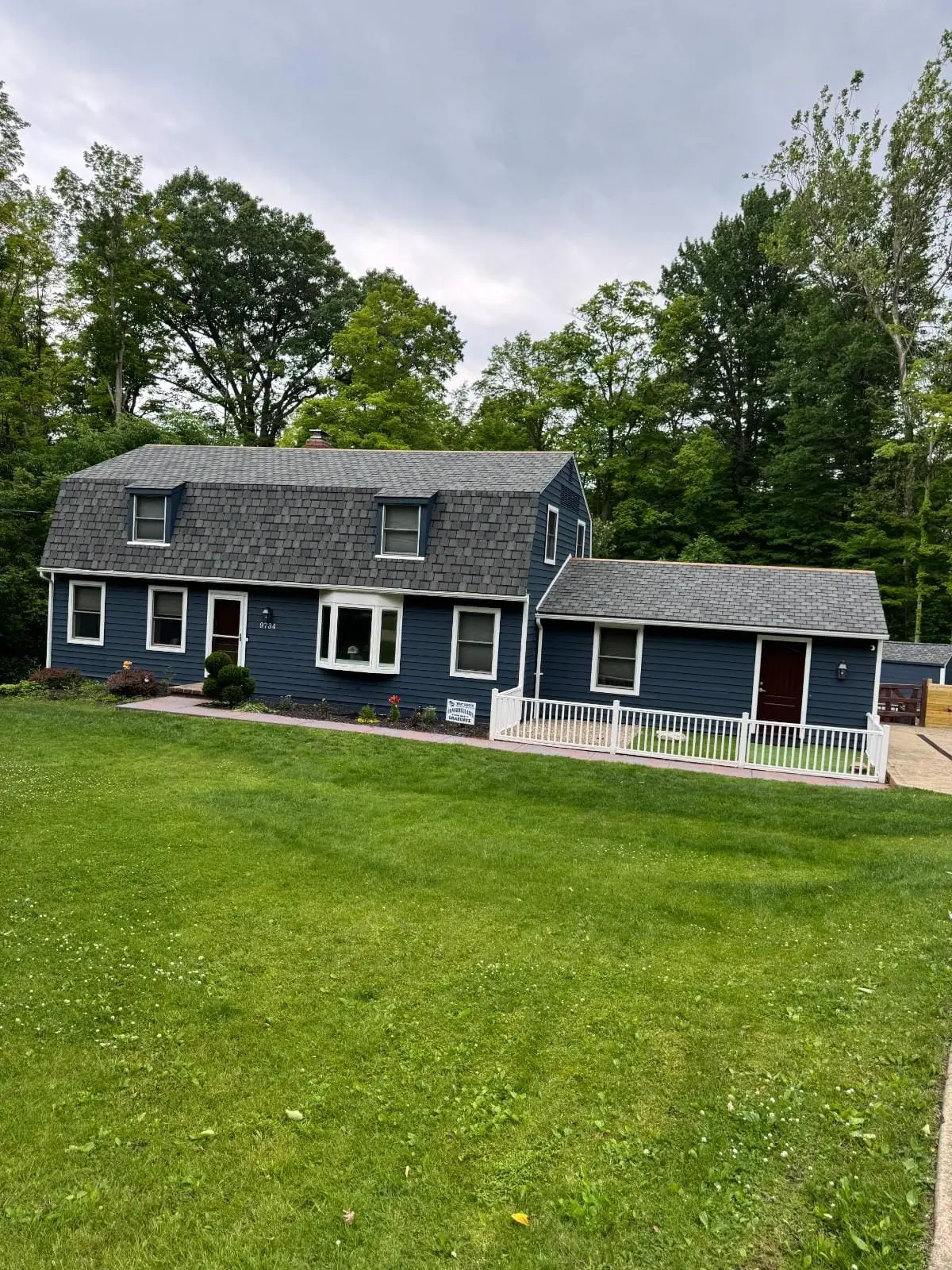 True North Painting exterior painting gallery navy blue two story home Chesterland Ohio