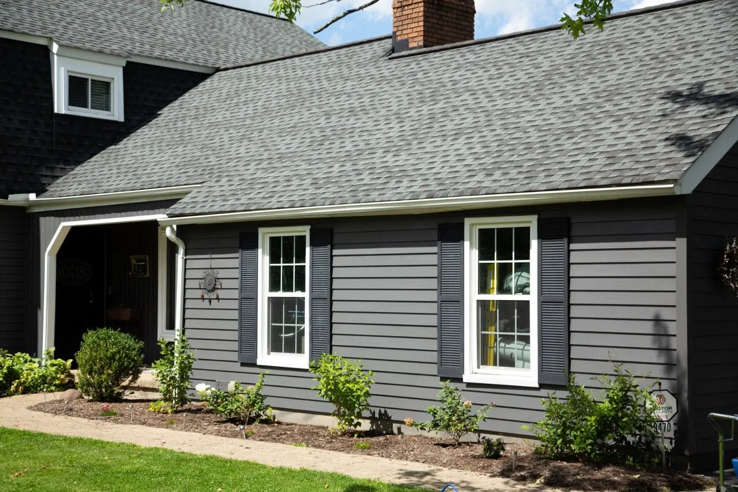True North Painting exterior painting gallery gray siding white trim Chesterland Ohio